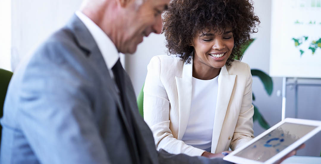 CEO, happy team and business people in training with tablet, teaching and internship in office. Manager, tech and senior mentor coaching woman, planning or diverse financial consultants in discussion.