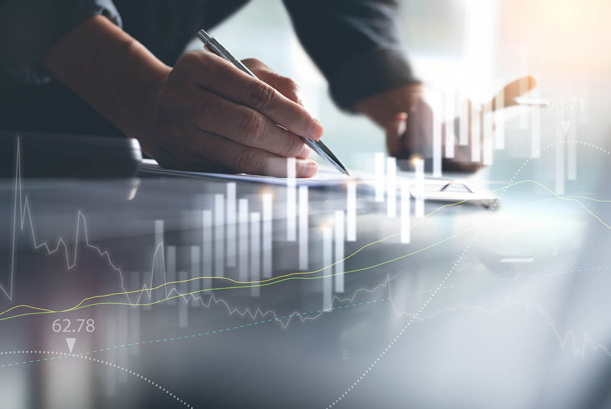 Business finance and investment background, businessman or finance analyst working in office with trading graph marketing report on virtual screen